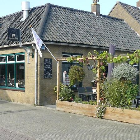 Eetcafe/Pension Nooitgedacht Strijen Exterior photo