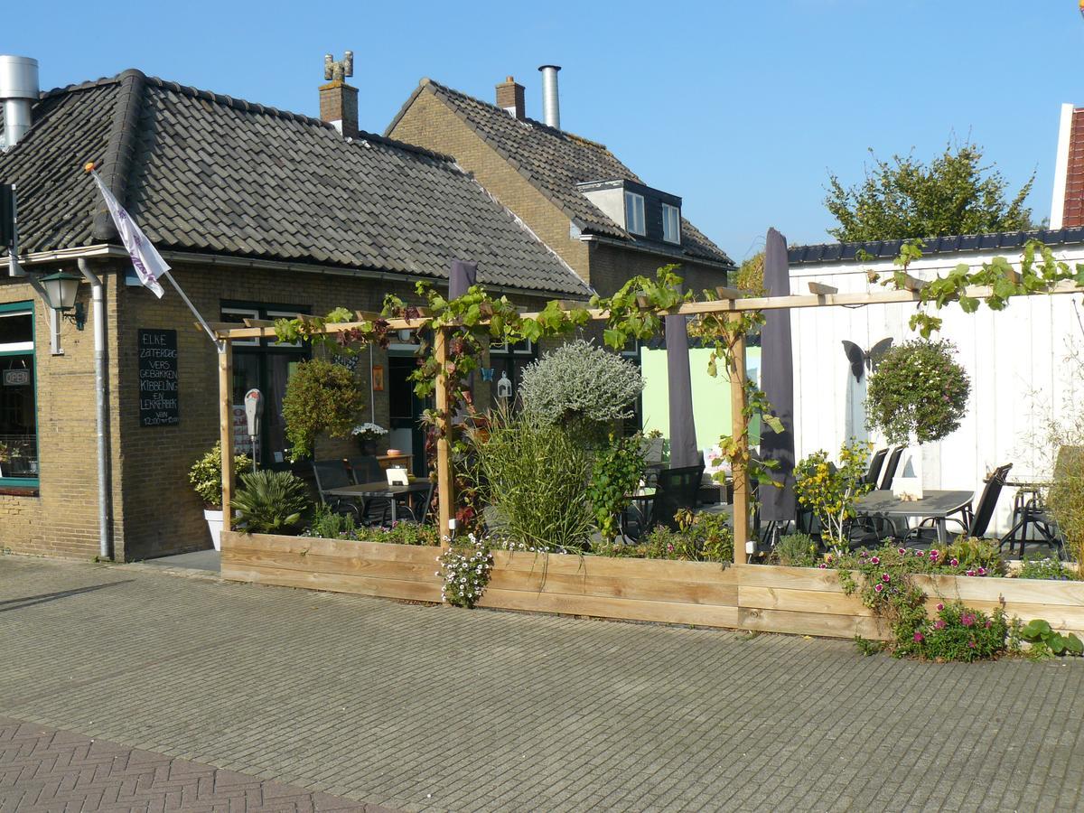 Eetcafe/Pension Nooitgedacht Strijen Exterior photo